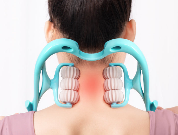 Person using a turquoise neck and shoulder massager on a white background