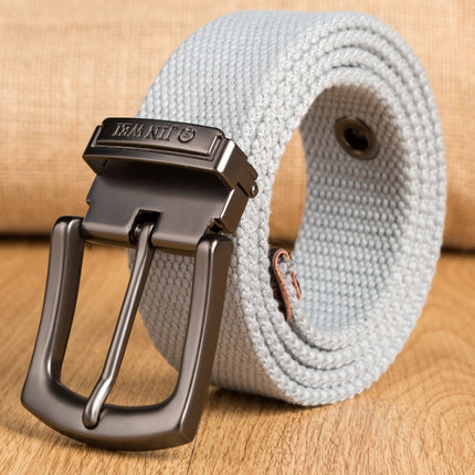 Light blue belt with a black buckle on a wooden surface