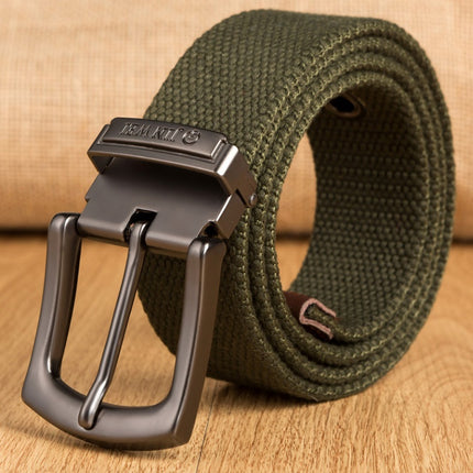 Green belt with black buckle on a wooden surface