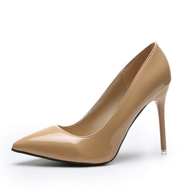 Beige high-heeled shoe on a white background