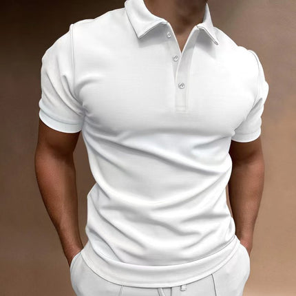 White polo shirt worn by a person on a brown background