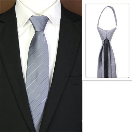 Gray striped tie on a suit with an inset showing a knot-free zipper design.