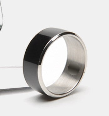 Silver ring with black interior on a white background
