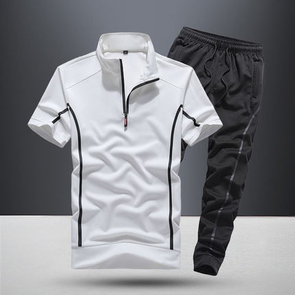 White and black tracksuit on a gray background