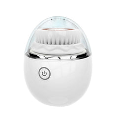 White facial cleansing brush with clear dome cover