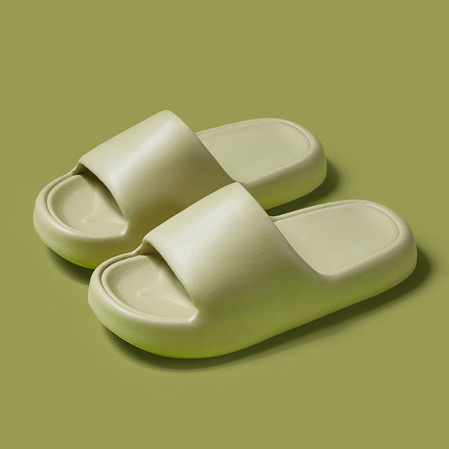 Pair of light green slides on a matching green background