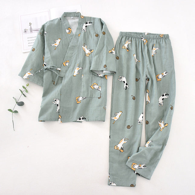 Green pajama set with dog pattern on a white background