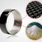 Metallic ring with close-up details on a white background