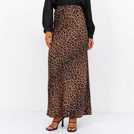 Leopard print skirt worn by a person on a white background