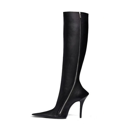 Black knee-high boot with a high heel on a white background