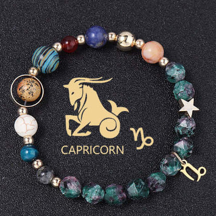 Beaded bracelet with Capricorn symbol on a black background