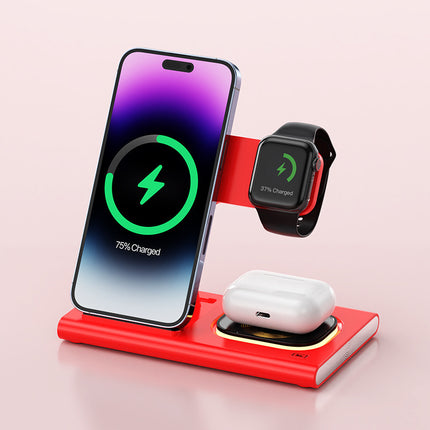 Red wireless charging stand with smartphone, smartwatch, and earbuds on a light pink background