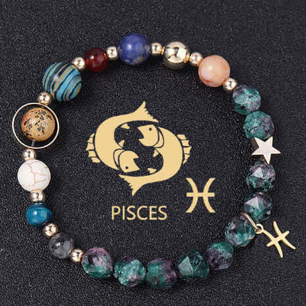 Beaded bracelet with Pisces symbol on a black background