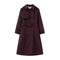 Purple trench coat with a belt on a white background