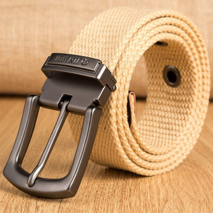 Beige belt with a black buckle on a wooden surface