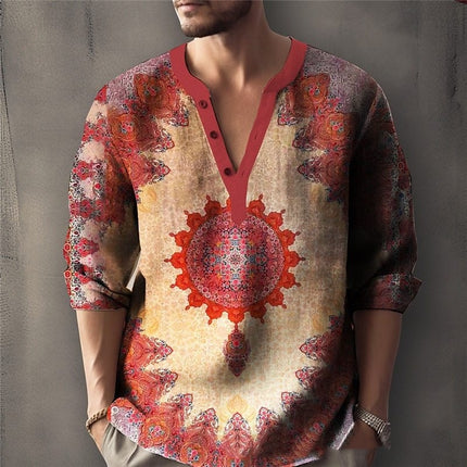 Man wearing a patterned shirt with red and beige design on a gray background