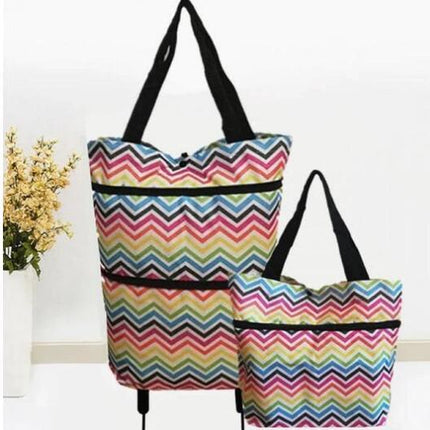 Two colorful chevron-patterned bags with black straps on a white background.