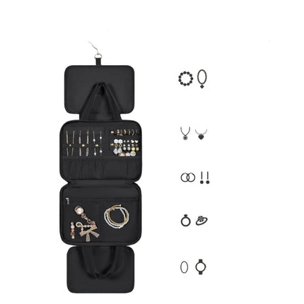 Black jewelry organizer with compartments for jewelry items on a white background