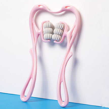 Pink facial roller with textured surface on a white and blue background