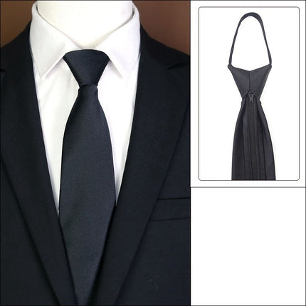 Black tie with zipper design on a mannequin wearing a suit.