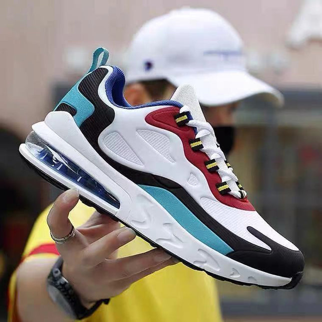 Colorful sneaker held by a person