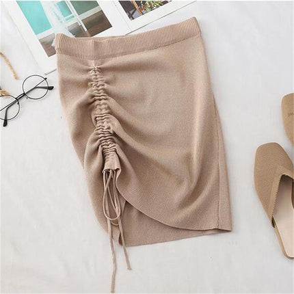 High waist knitted rib skirt in beige with drawstring detail, ideal for women's casual and stylish outfits.