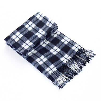 Plaid blanket with fringes on a white background