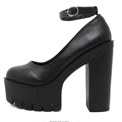 Black platform high heel shoe on a white background