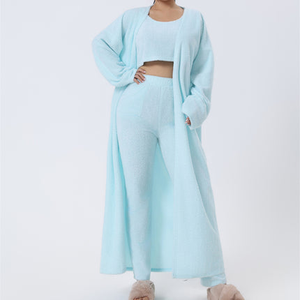 Light blue outfit with a matching cardigan on a white background