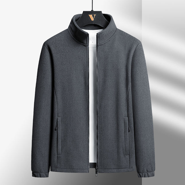 Gray jacket on a hanger against a light gray background