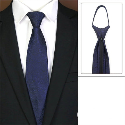 Blue tie with knot-free zipper feature on a suit.