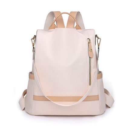 Beige backpack with tan straps on a white background