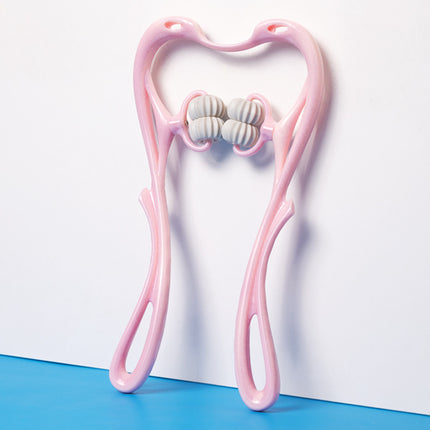 Pink dental massager with dimensions on a white background