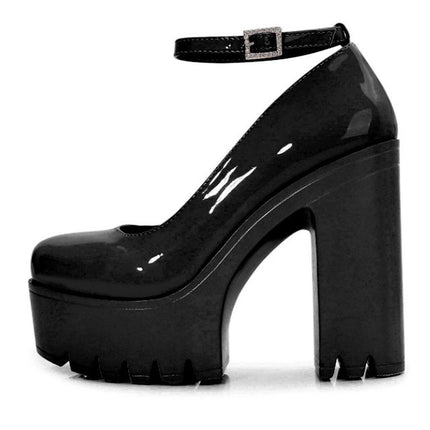 Black platform high heel shoe on a white background