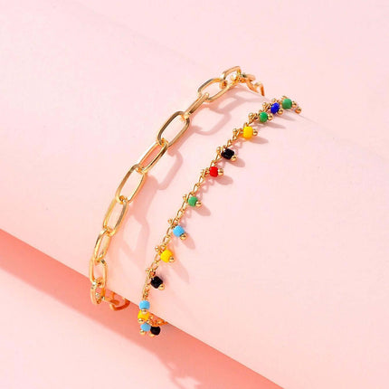 Gold beaded double-circle anklet with colorful beads, stylish geometric design for women, perfect for all occasions.