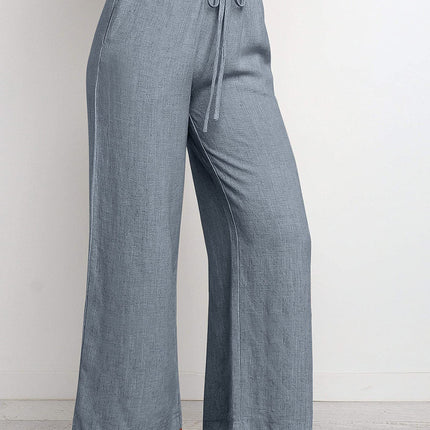 Blue wide-leg pants with a tie waist on a white background