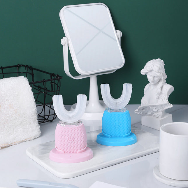 Two colorful dental devices on stands with a small mirror in the background.