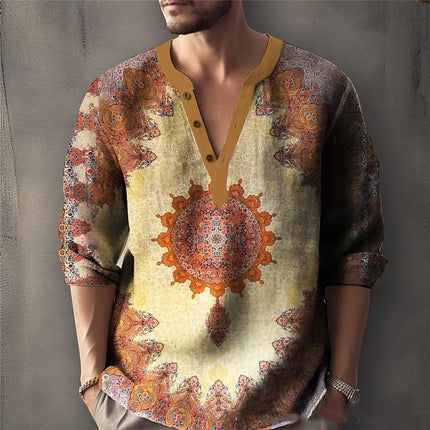 Man wearing a patterned shirt with a decorative center design on a plain background