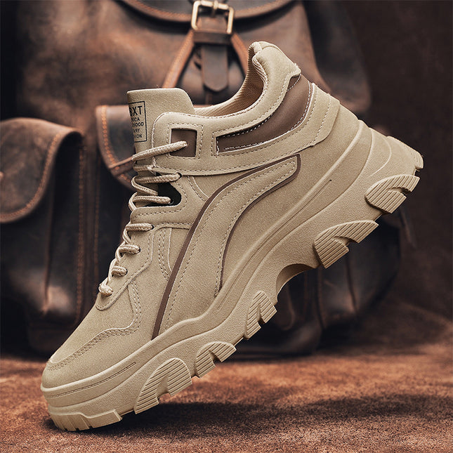 Beige sneaker with thick sole on a brown background