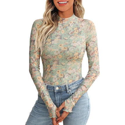 Woman wearing a floral long-sleeve top and jeans on a white background