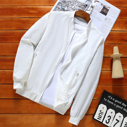 White jacket on a hanger with a white shirt underneath on a wooden surface.