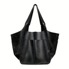 Black leather tote bag on a white background
