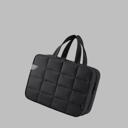 Black quilted fabric bag with text 'Soft, Lightweight Nylon Fabric' on a white background