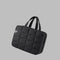 Black quilted fabric bag with text 'Soft, Lightweight Nylon Fabric' on a white background