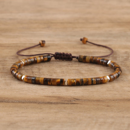Adjustable women's beaded bracelet featuring natural tiger's eye stones in a hand-woven design.