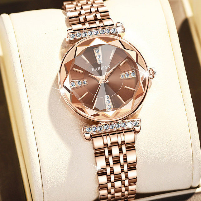 Women’s diamond mirror fashion steel watch with round dial, stainless steel strap, and waterproof quartz movement.