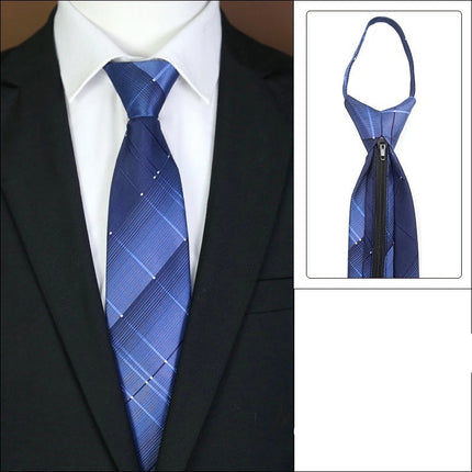 Blue plaid tie with a zipper on a suit jacket.