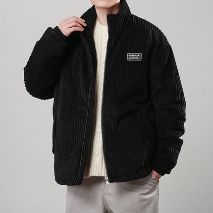 Person wearing a black corduroy jacket
