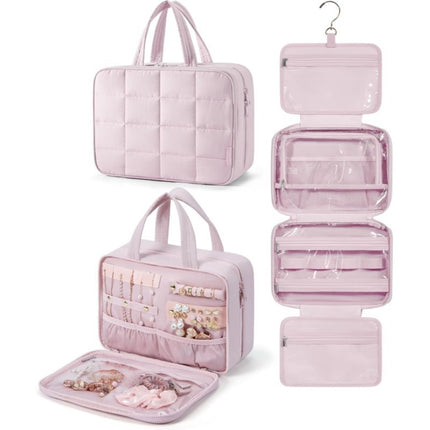 Pink travel organizer with multiple compartments on a white background