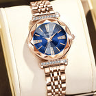 Women’s diamond mirror fashion steel watch with round dial, stainless steel strap, and waterproof quartz movement.